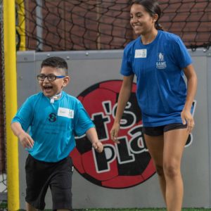 Happy child in soccer game